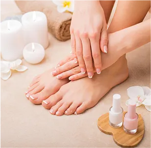 Women foot and hand massage with nail polish